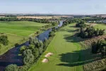 River flowing through the Roxburghe Hotel Golf & Spa's scenic course, highlighting its lush landscape.