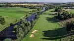 Golf course with a river at 12.18. Roxburghe Hotel Golf & Spa Ltd., featuring lush greens and serene landscape.