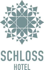 Logo with a star for SCHLOSS HOTEL, part of 12.18. Roxburghe Hotel Golf & Spa Ltd. collection