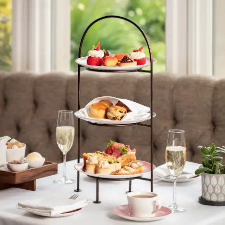 Delightful festive afternoon tea with pastries and champagne at Roxburghe Hotel Golf & Spa.