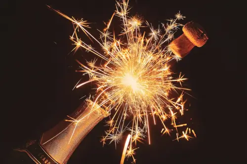 Champagne bottle with sparkler celebrating festive occasions at Roxburghe Hotel.