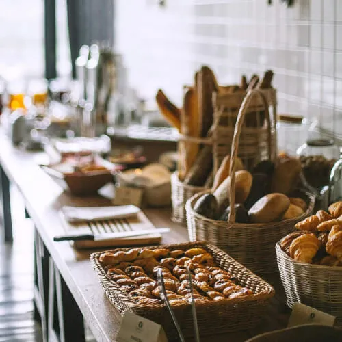 A display of assorted pastries and baked goods, perfect for children's breakfast.