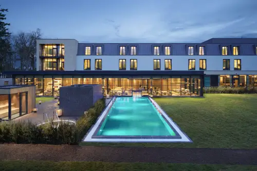 Roxburghe Hotel Golf & Spa with a beautiful pool and modern architecture.