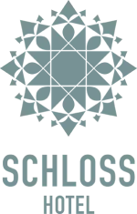 Logo of Schloss Hotel showcasing luxury and elegance.