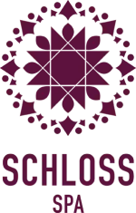 Logo of Schloss Spa featuring a floral design.