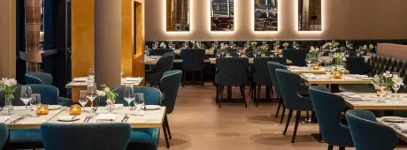 Elegant restaurant interior at Roxburghe Hotel showcasing modern dining.
